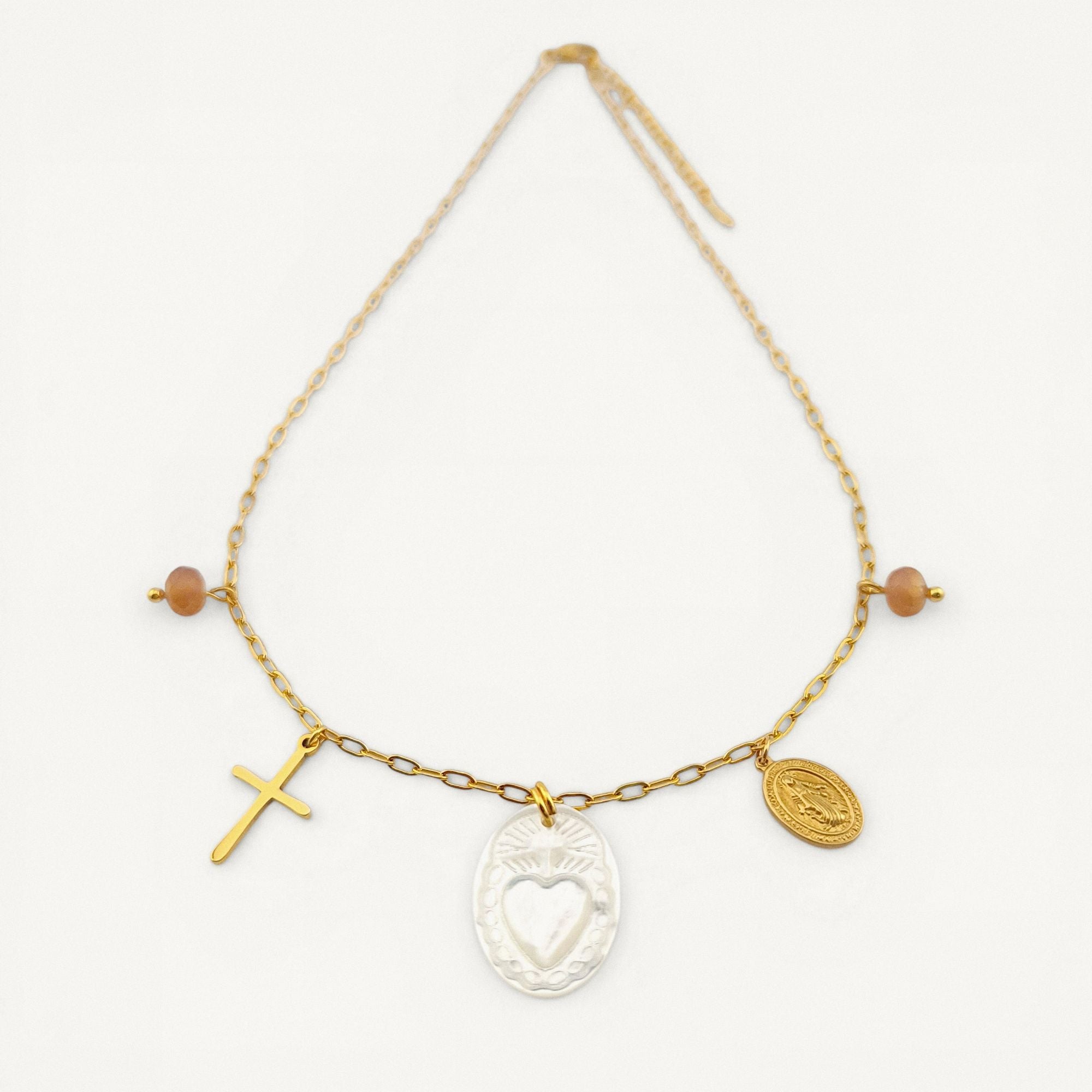 Colar gargantilha em aço inoxidável dourado com medalha em madre pérola Sagrado Coração de Maria, cruz e medalha N. S. das Graças. Coleção Religiosos | Joias de Fé