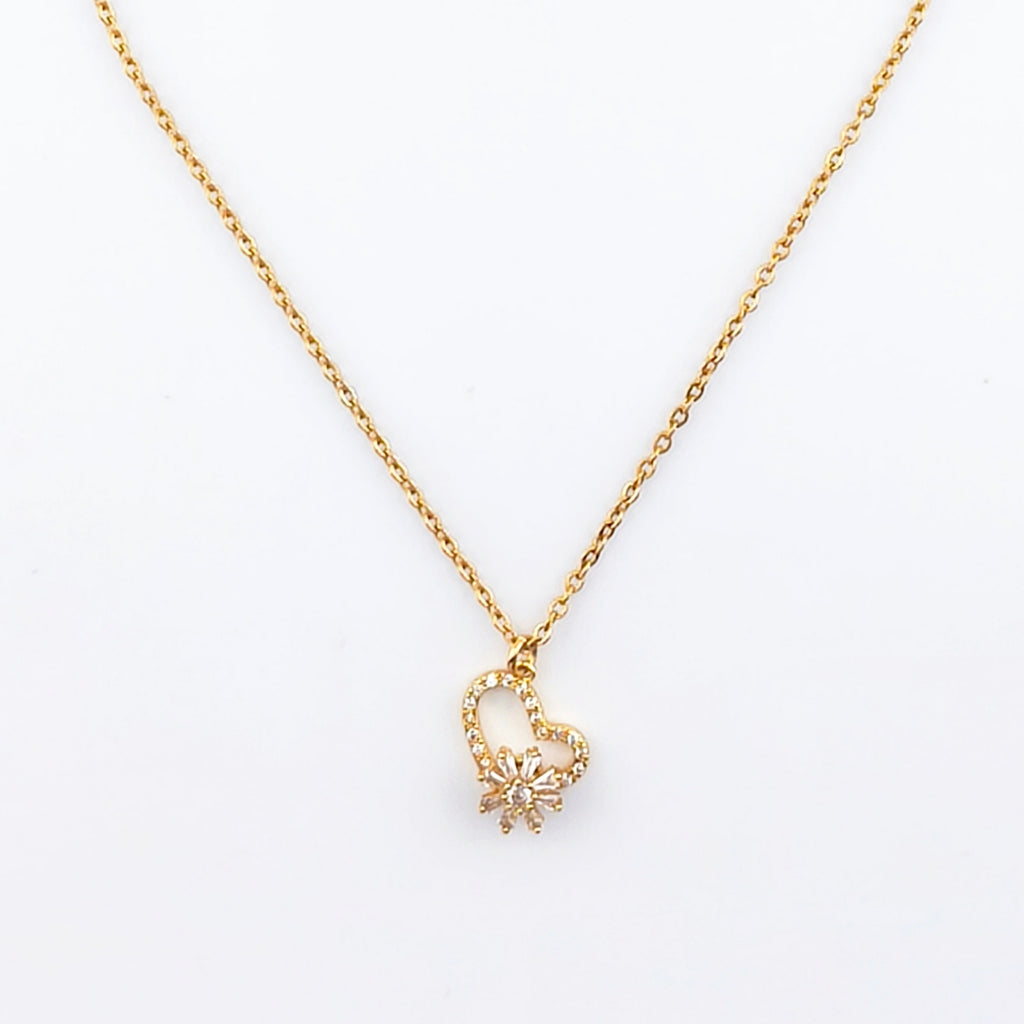 Gold-tone wire, openwork heart pendant with rotating flower set with cubic zirconia | Hearts Collection – Amor Jewelry 