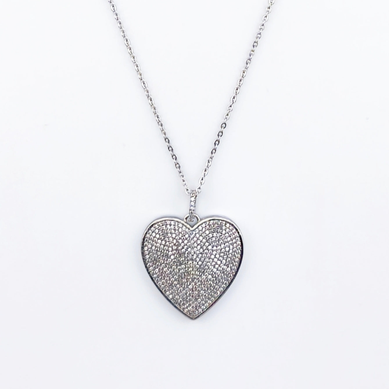 Silver wire, flat heart pendant set with cubic zirconia | Hearts Collection – Amor Jewelry 