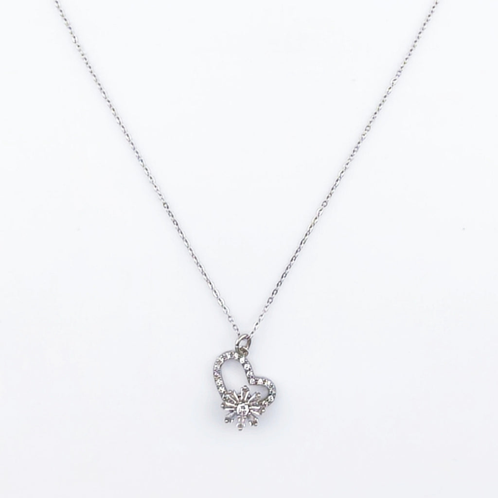 Gold-tone wire, openwork heart pendant with rotating flower set with cubic zirconia | Hearts Collection – Amor Jewelry 