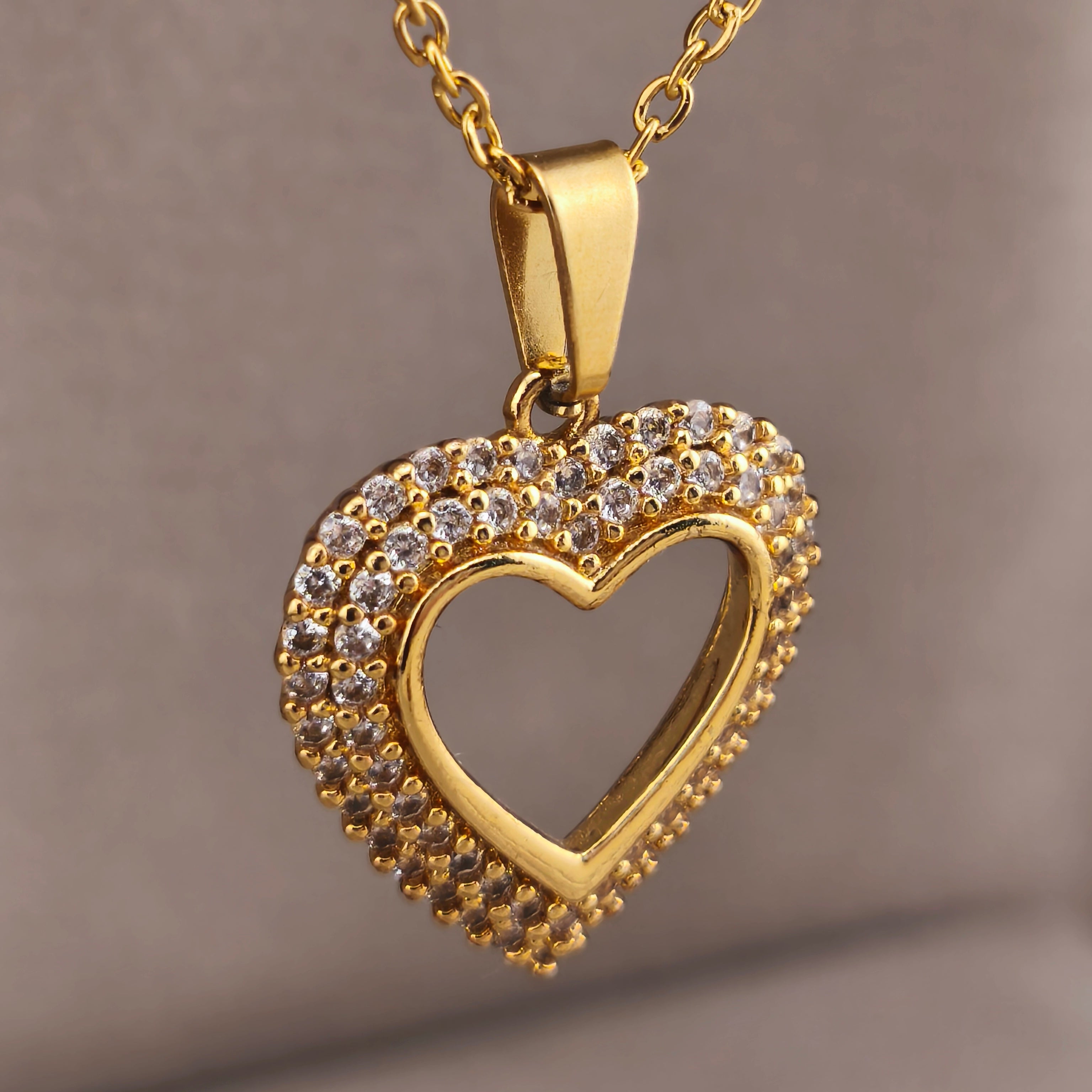 Gold-tone wire, openwork heart pendant with cubic zirconia | Hearts Collection – Amor Jewelry
